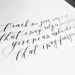 Black and white calligraphy script on paper