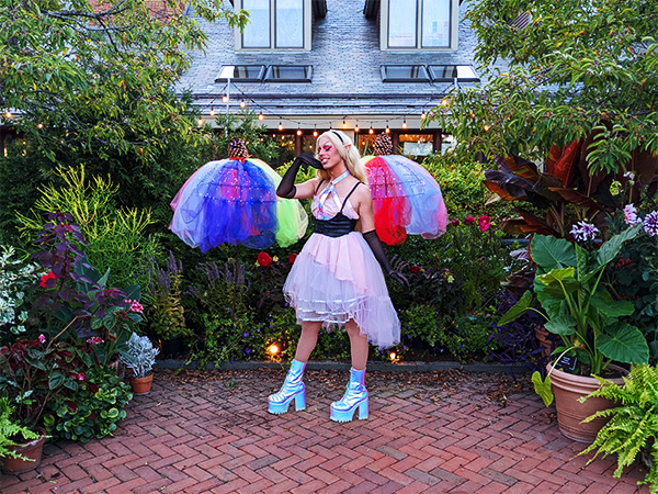 A photo of Harley Queen posing in the Winter Garden.